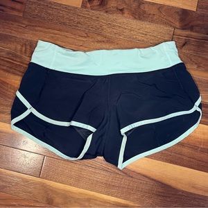 Lululemon Speed Shorts size 4. Black and green